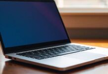 Modern budget-friendly laptop on a wooden desk.