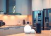 Futuristic kitchen with advanced smart appliances and technology.